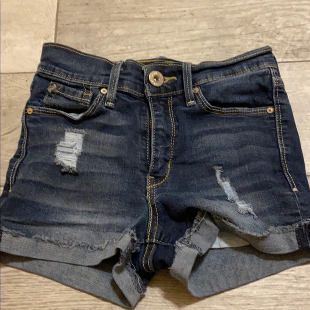 Distressed denim shorts